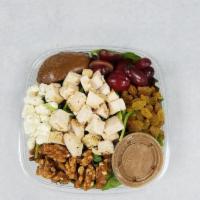 Bistro Chicken Salad · Field greens, seedless grapes, craisins, blue cheese, candied walnuts and caramelized pears ...