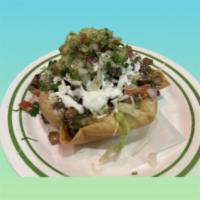Taco Bowl · Lettuce, Pico de Gallo, Guacamole, Mozarella Cheese, Sour Cream and your choice of Meat