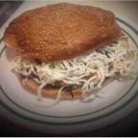Pollo a la Parrilla Cemita · Grilled chicken mexican sandwich on a sesame roll filled with oaxaca cheese, chipotle sauce,...