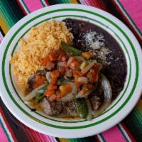 Bistec a la Mexicana · Steak sauteed with onion, jalapeno pepper and tomato. Accompanied with corn tortillas, rice ...