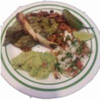 Carnitas Platillo · Pulled Pork accompanied with pico de gallo, guacamole, cactus, jalapeno, bulb onion, corn to...