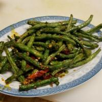 Dried Cooked String Beans Specialty · Spicy. Green string beans fried then stir-fried with green onions, chili peppers, garlic.