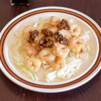 Honey Walnut Shrimp · Fried shrimp with chopped cabbage in a sweet sauce. Topped off with candied walnuts.
