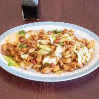Kung Pao Chicken · Spicy. Chicken stir-fried with cabbage, chili peppers in a sweet-spicy sauce. Contains peanu...