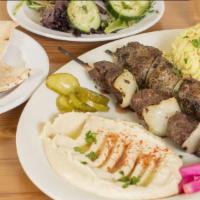 Tri Tip  Beef Kabob Plate · 2 Grilled Skewers of marinated Beef Tri-tip  . Served with rice, hummus, salad and pita.