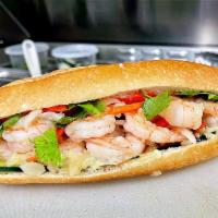 Garlic Shrimp Banh Mi (Vietnamese sandwich) · Garlic shrimp, pickled carrots, cucumber, onion, salt & pepper, and mayo.