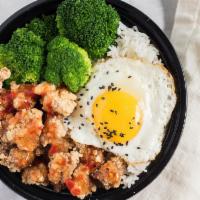 Rice Bowl - Popcorn Chicken · Our popcorn chicken over white rice and steamed veggies with sweet chili sauce.  Egg optional.
