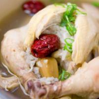 Sam Gye Tang · Whole Cornish game hen stuffed with sweet rice, ginseng, garlic, chestnuts & dates cooked in...