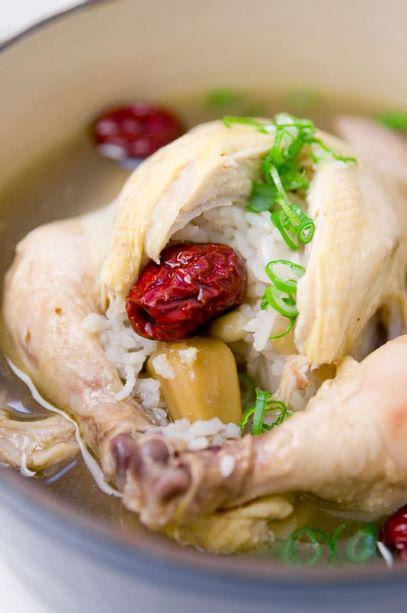 Sam Gye Tang · Whole Cornish game hen stuffed with sweet rice, ginseng, garlic, chestnuts & dates cooked in a clean, full bodied chicken broth. Very popular item.