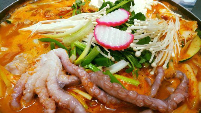 Hae Mul Jeongol · A fresh variety of mixed seafood including shrimp, cod, squid, octopus and crab cooked with vegetables, tofu, and udon noodles all simmered into a spicy seafood broth. Not spicy is option as well. (Spicy or Not Spicy) Serves up to four.