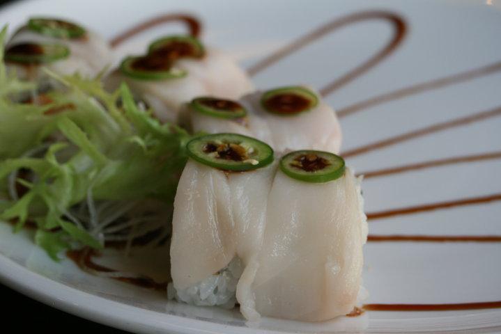 Angel Roll · Jalapeno pepper, eel sauce, spicy crab meat, asparagus, white tuna sashimi.