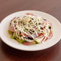 Antipasto Salad · Romaine lettuce, tomato, olives, red onions, green peppers, salami and mozzarella.