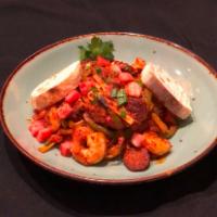 Cajun Shrimp & Sausage Pasta · tender shrimp, chorizo & vegetables tossed with pasta in a Cajun sauce; with garlic baguette