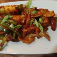 Chili Paneer · Homemade Indian cheese pan-fried and tossed in spicy chili sauce. Vegetarian.