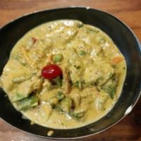 Navratan Korma · Assorted vegetables in a special sauce with nuts and fruits. Vegetarian.
