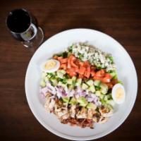 Grilled Chicken Cobb Salad · Grilled chicken, fresh greens, avocado, tomatoes, cucumbers, red onion, hard-boiled egg, smo...