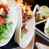BBC Taco’s · Your choice of fried chicken, pulled pork or beer battered fish served in warmed grilled flo...