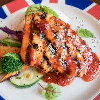 Sweet Thai Chili Salmon · Perfectly grilled North Atlantic salmon glazed with a sweet Thai chili sauce. Served with fr...
