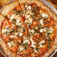 BBC Rustic Pizza · Ricotta cheese, red sauce, Italian sausage, chopped tomato, fresh basil. Finished with crush...