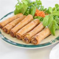 K1. Egg Rolls · A savory mixture of ground chicken, jicama, carrot, taro, onion, and noodles. Wrapped and fr...