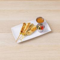 Chicken Satay (4 skewers) · Grilled marinated chicken on skewers. Served with peanut sauce and cucumber sauce. 