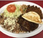 Fajitas Chicken · Grilled chicken strips sauteed with onions, tomatoes and bell peppers served with rice, re-fried beans, lettuce, sour cream, guacamole and tortillas.