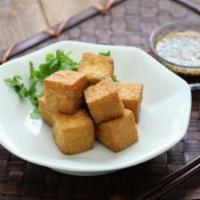 A09. Fried Tofu (6pcs) · Deep-fried tofu. Served with sweet and sour sauce.