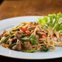 F08. Pad Khee Mao (Drunken Noodles) · Stir-fried flat noodle sautéed in Thai chili-garlic sauce, onion, basil leaves, tomatoes, Th...