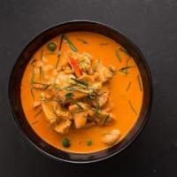 E01. Red Curry · Thai style red curry with Thai chili pasted and your choice of meat. Top with bamboo shoot, ...