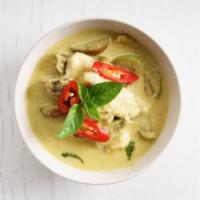 E03. Green Curry · Thai style green curry with thai chili pasted and your choice of meat. Top with coconut milk...