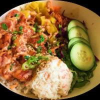 Flaming Tuna Poke Bowl · Spicy Tuna, Crab salad, drizzled with eel sauce and spicy mayo. Served with Japanese salad a...