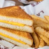 Grilled Cheese Sandwich Meal Combo · Melted cheese on Texas toast, crinkle cut fries, and 20 oz. drink.