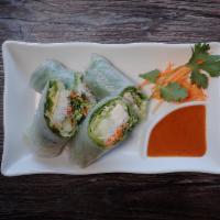 Fresh Spring Rolls · With green leaf, lettuce, carrot, cucumber, cilantro, tofu and vermicelli. Served with peanu...