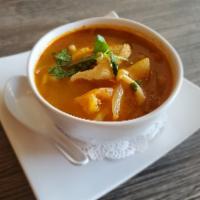 (S)Tom Yum Soup · Hot and sour lemongrass soup with fresh mushroom and tomato, onion and cilantro.