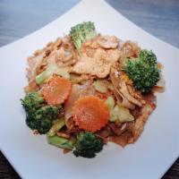 Pad See-Ew · With egg, broccoli and carrot.