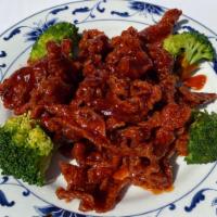 J & M House Beef · Deep-fried crispy beef cooked with J & M house special sauce. Hot and spicy.