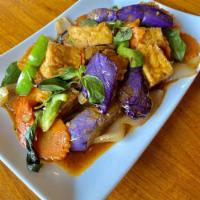 Spicy Eggplant with Tofu · Asian eggplant stir-fried with fried tofu, basil, bell peppers, onions, and carrots, in our ...