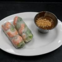 A1. Summer Rolls · Shrimp, lettuce, and noodles wrapped in rice paper served cold with peanut sauce. 