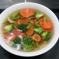 V2. Vegetable Noodle Soup · Rice noodles, tofu, broccoli, carrots and celery in vegetable broth served with a side salad...