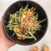 Green Beans · Miso tahini, topped w/ fried onions.