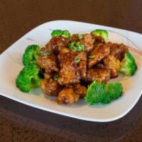 General Tso's Chicken 左宗鸡 · breaded chicken thighs deep fried and then stir fried with red sweet sauce.