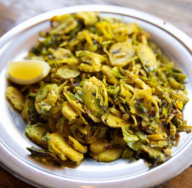 Turmeric Roasted Brussels Sprouts (GF) · Roasted Brussels Sprouts tossed with hazelnuts (can not be left out) and lemon