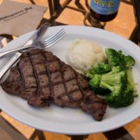 Ribeye Steak Dinner · 14 oz. USDA ribeye steak. Served with choice of 2 sides. 