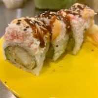Tiger Roll · Inside: Tempura shrimp, cucumber. Top: crab salad, sesame seed, spicy mayo and eel sauce.
