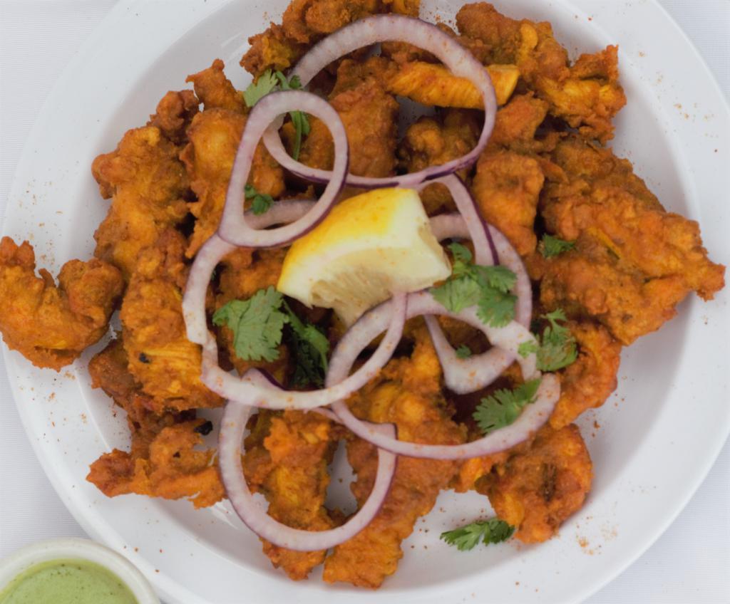 4. Chicken Pakora · Chicken fritters mixed with house spices and batter fried.