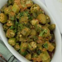 24. Bhindi Masala · Okra sauteed with fresh tomatoes, onion and house spices. Served with basmati rice. Vegetari...