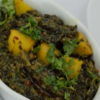 29. Aloo Saag · Fresh spinach ant potatoes cooked in house spices served with basmati rice. Vegetarian.