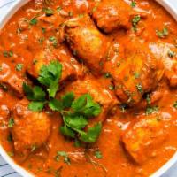 30. Chicken Tikka Masala · BBQ chicken cooked in tomato sauce. Served with basmati rice.