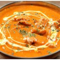 33. Butter Chicken Karahi For 2 · Boneless chicken cooked with creamy tomato sauce with basmati rice ,2 naan bread and salad.