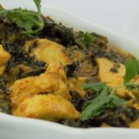 34. Chicken Saag · Chicken cooked with spinach and house spices. Served with basmati rice.